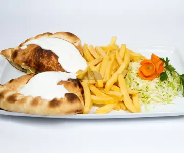 Ceafă de porc învelită în aluat de pizza
